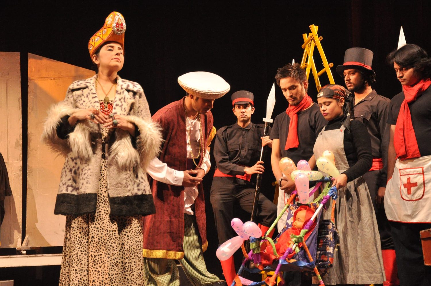Students performing a colourful cultural dance during a school festival